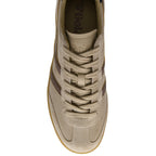 Beige trainer with Gola logo on a white background