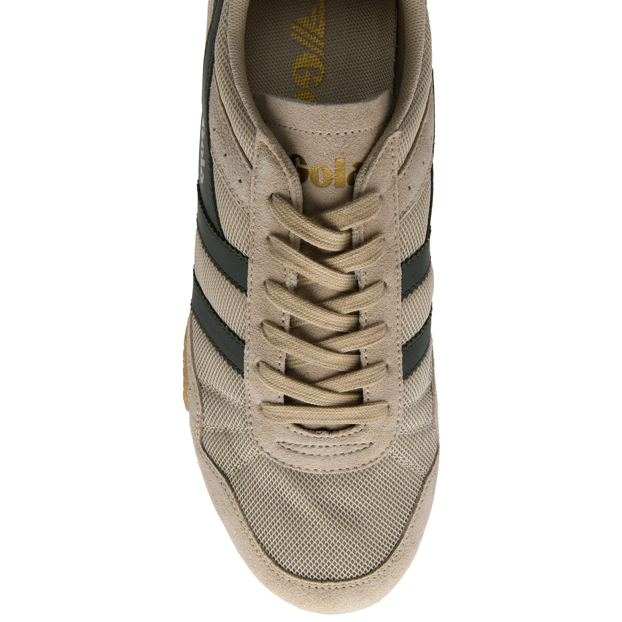 Beige trainer with black stripes on a white background