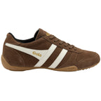 Brown trainer with white stripes and 'Gola' branding on a white background