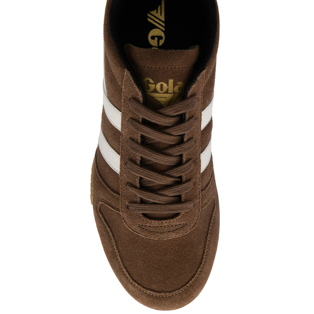Brown trainer with white stripes on a white background