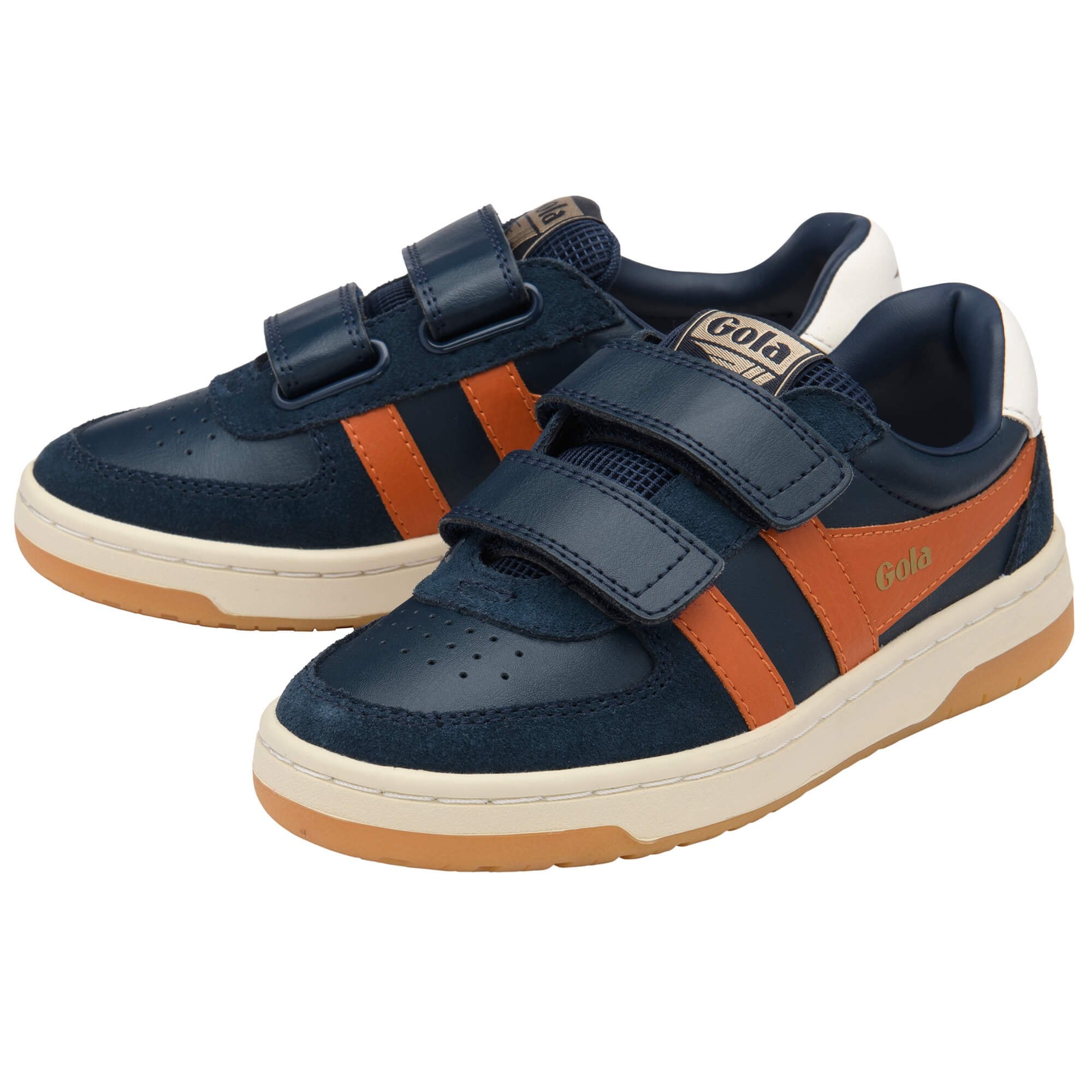 Pair of navy and orange trainers with velcro straps on a white background