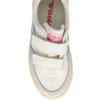 Top down view of a white Gola trainer with two velcro straps and a light blue stripe on the side on a white background