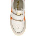 Top-down view of a white Gola trainer with orange stripes and two velcro straps on a white background
