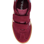 Red children's Gola trainer with white stripes on a white background