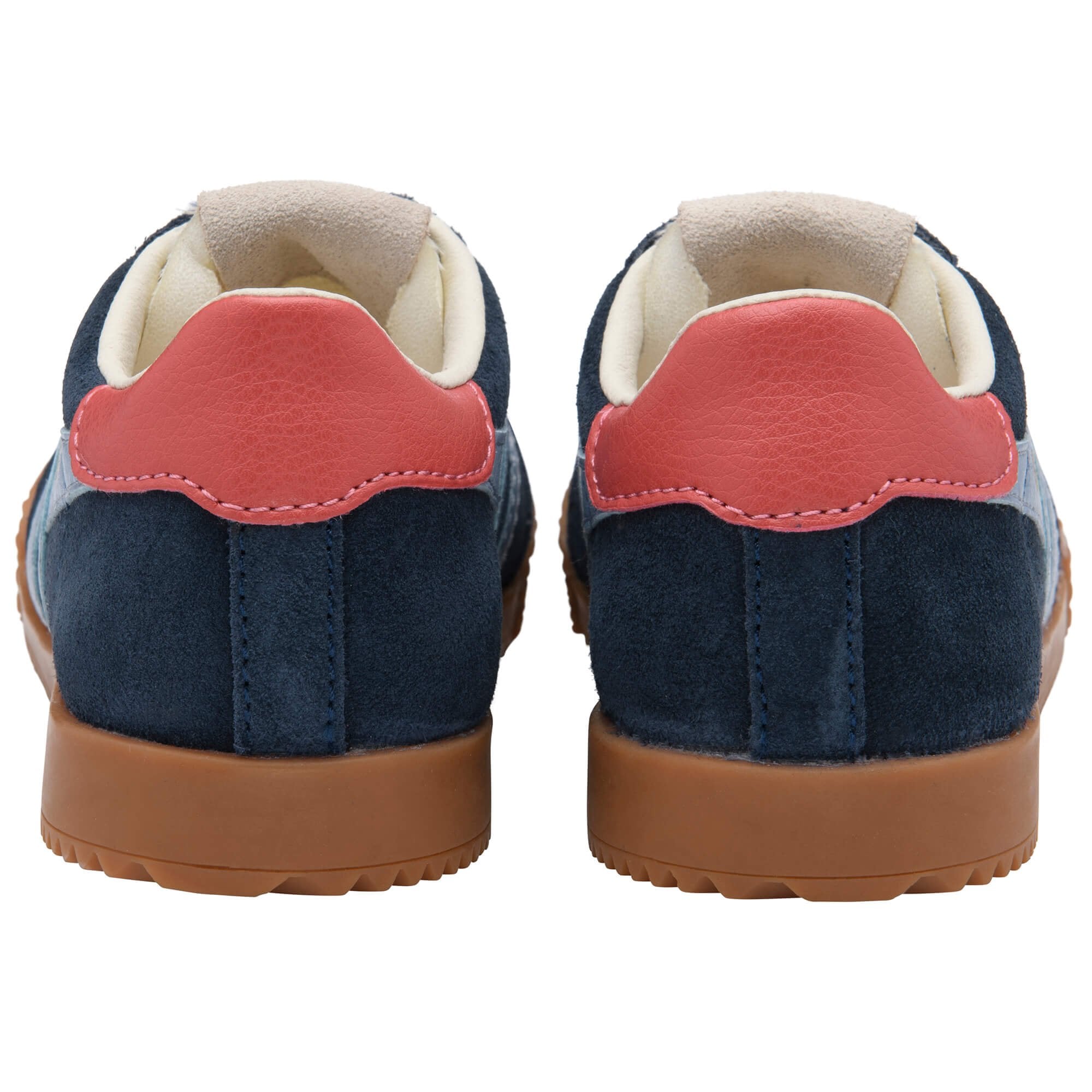 Pair of navy blue suede Gola trainers with red leather heel tabs and brown rubber soles on a white background