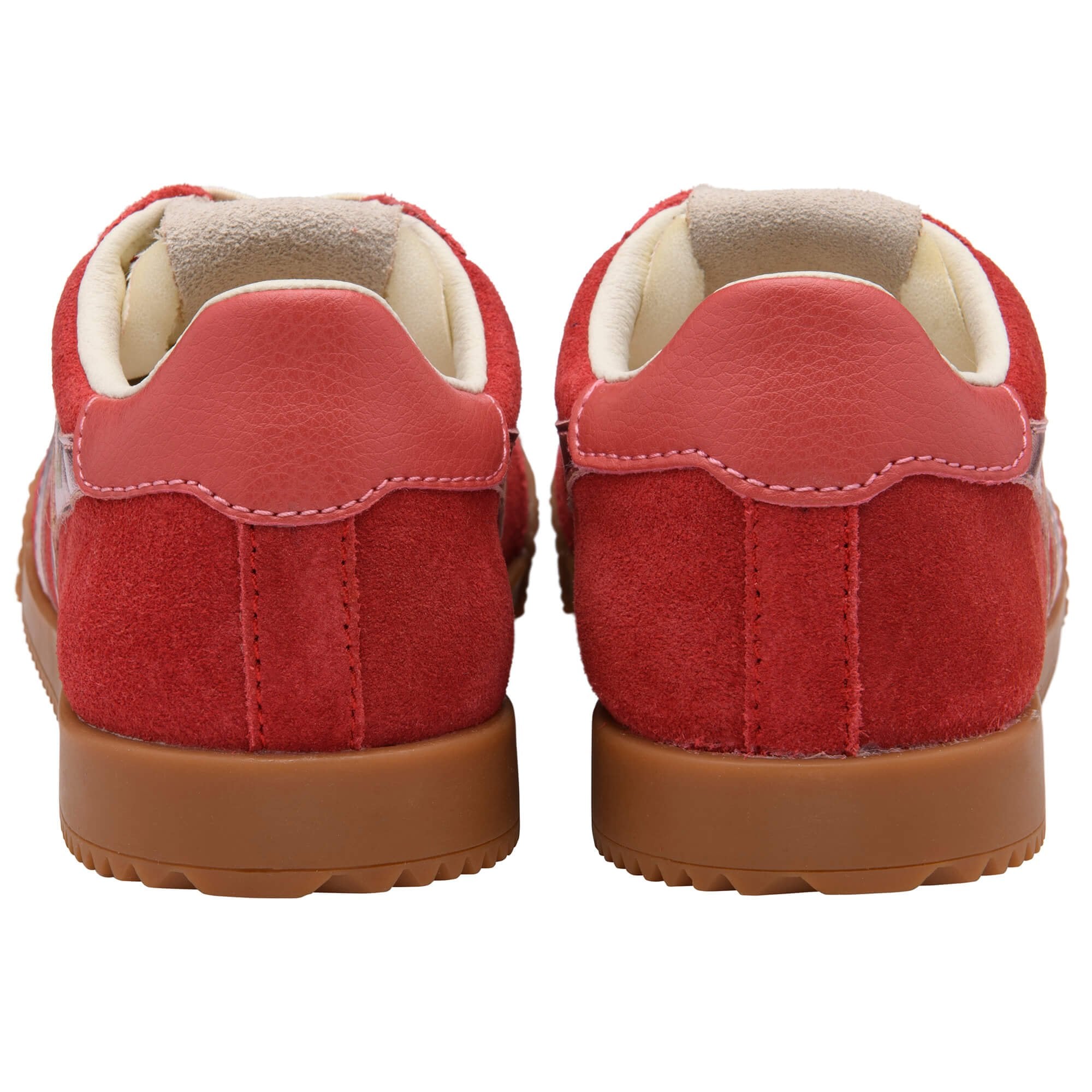 Pair of red Gola trainers with brown soles on a white background