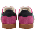Pink Gola trainer with a brown sole on a white background