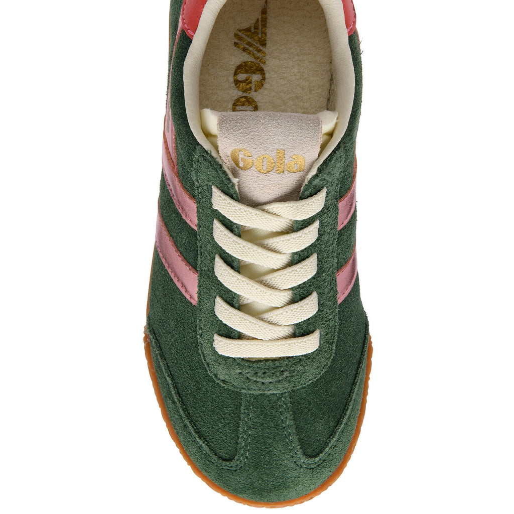 Top down view of a green suede Gola trainer with pink stripes and white laces on a white background
