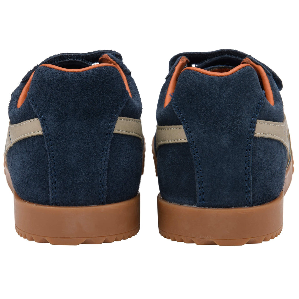Pair of navy blue Gola trainers with brown soles on a white background
