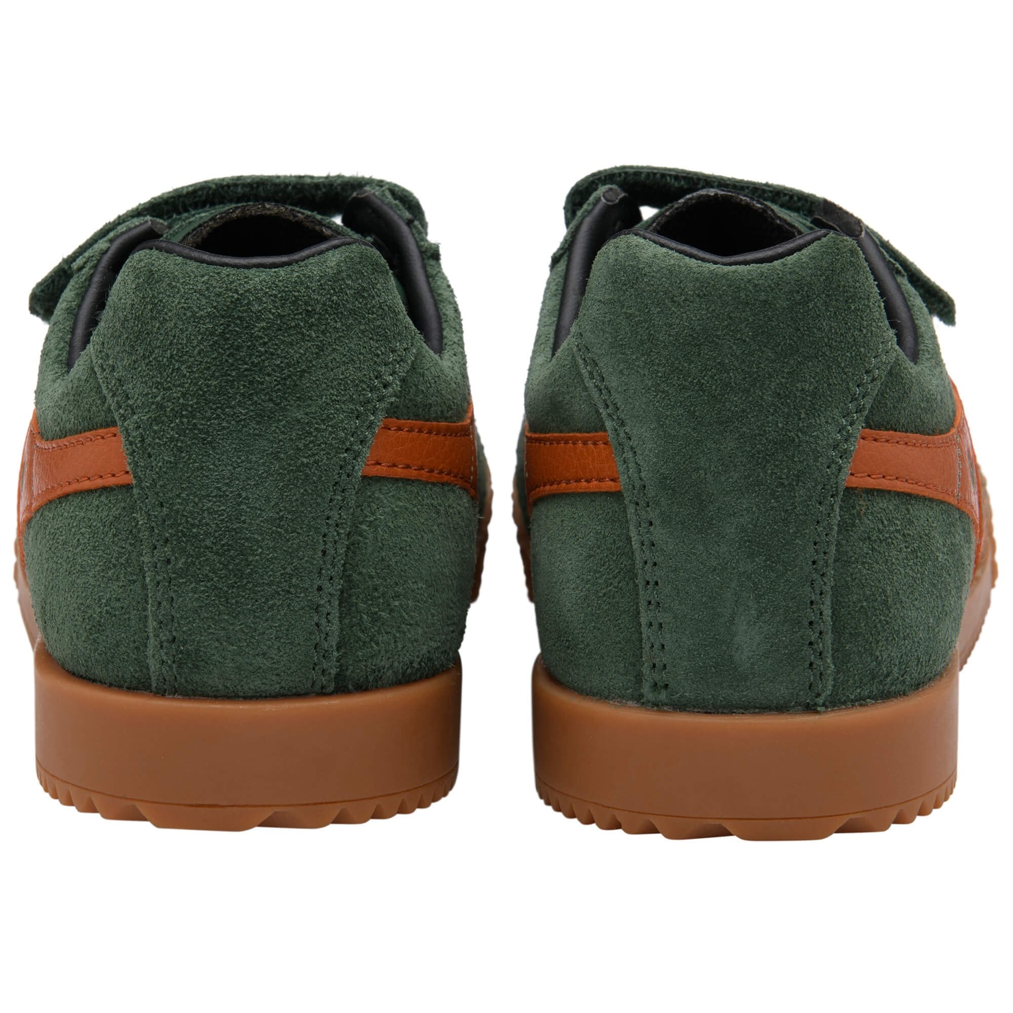 Green suede Gola trainers with brown soles on a white background