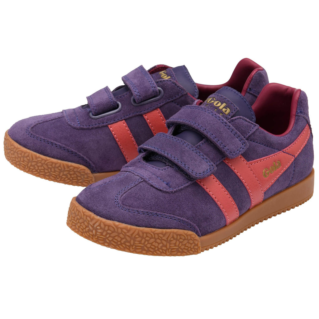 Pair of purple suede Gola trainers with two coral stripes and two velcro straps on a white background
