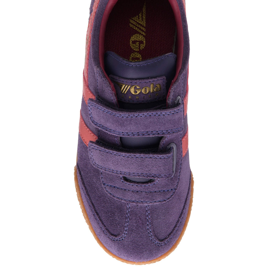 Purple children's Gola trainer with velcro straps on a white background