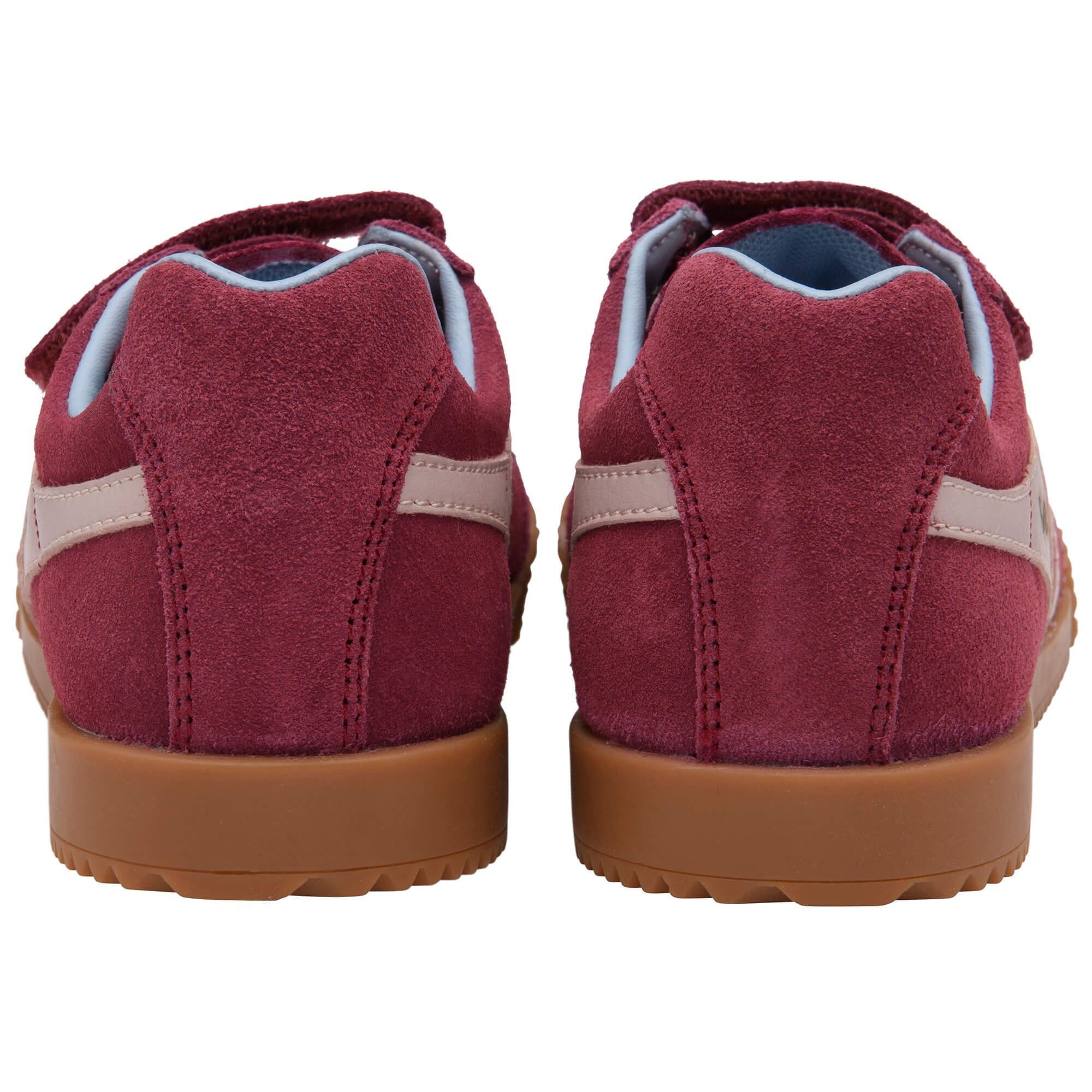 Red Gola trainers with brown soles on a white background