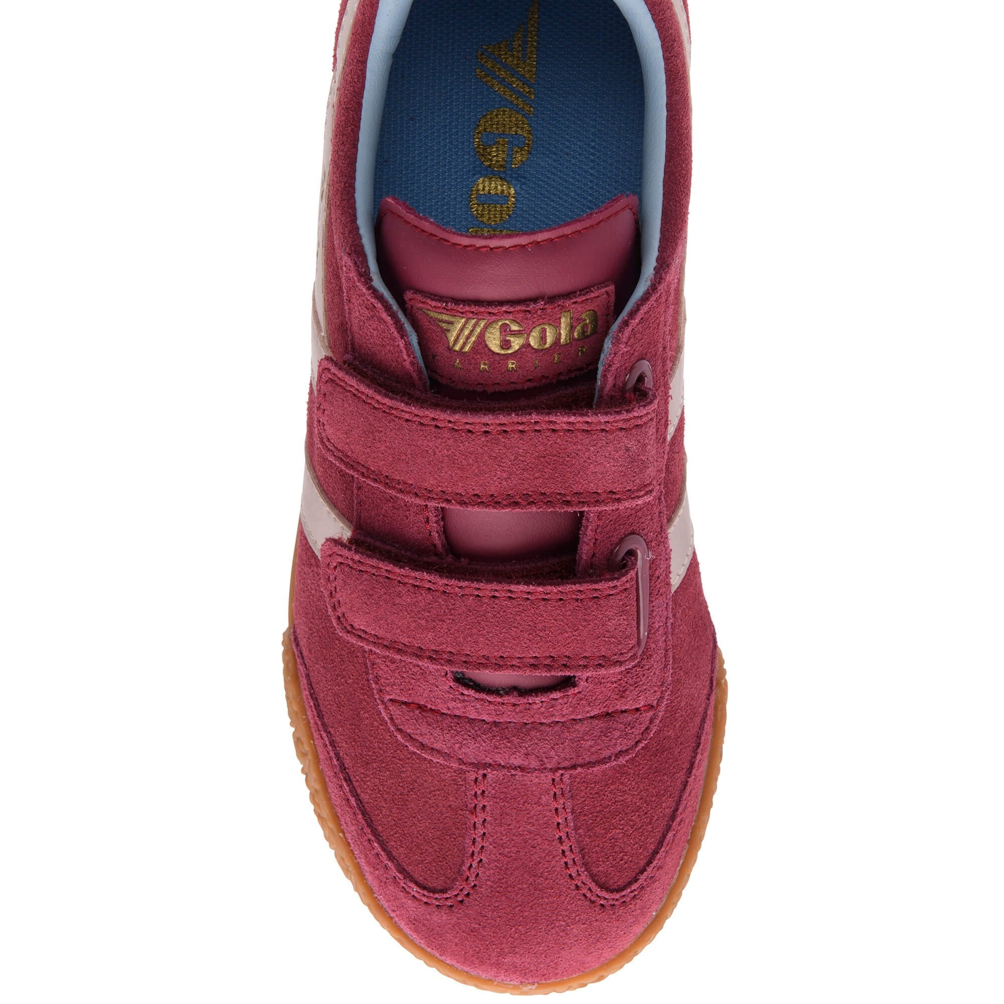 Close up of a Gola kids trainer in burgundy suede with two velcro straps and a gum sole
