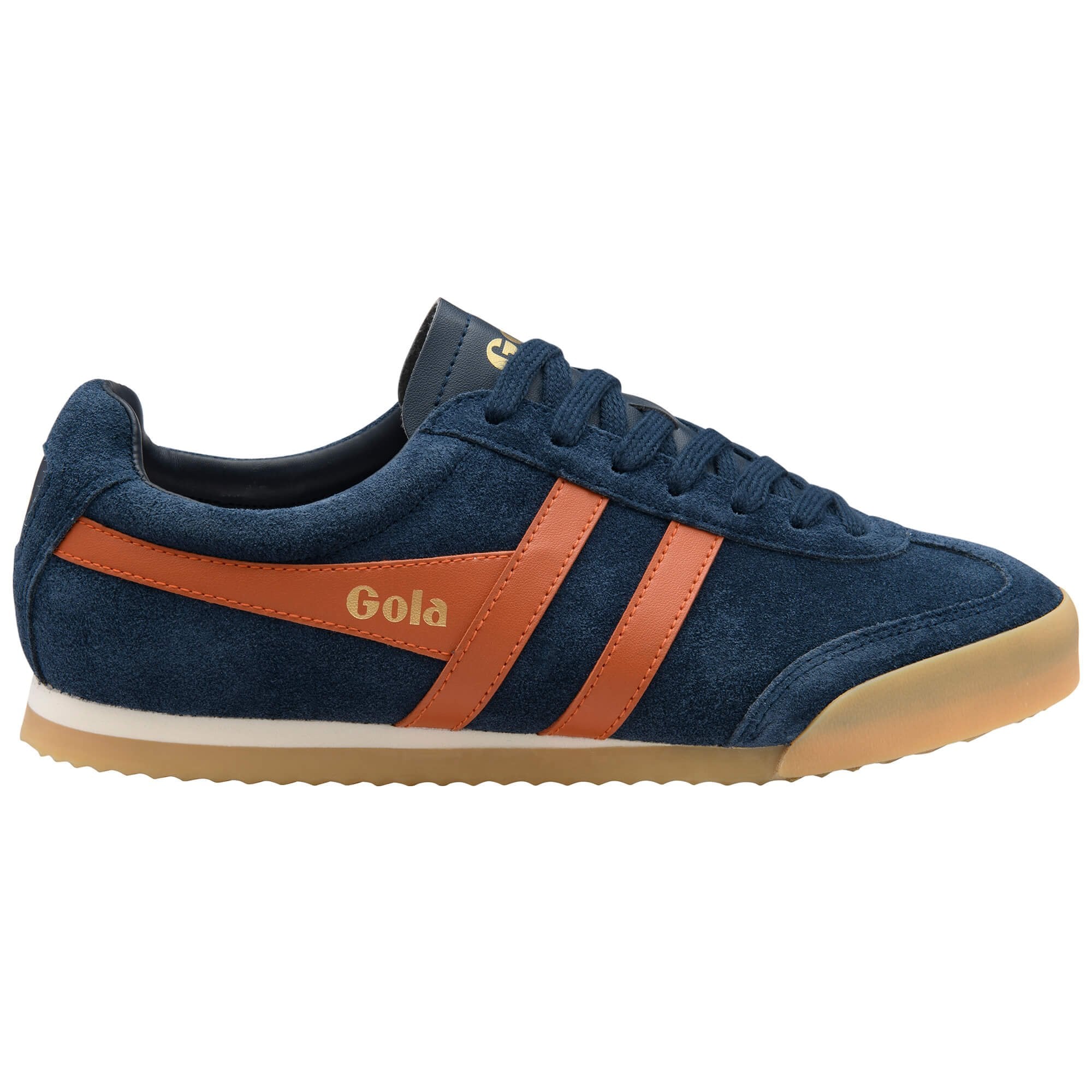 Navy blue trainer with orange accents on a white background