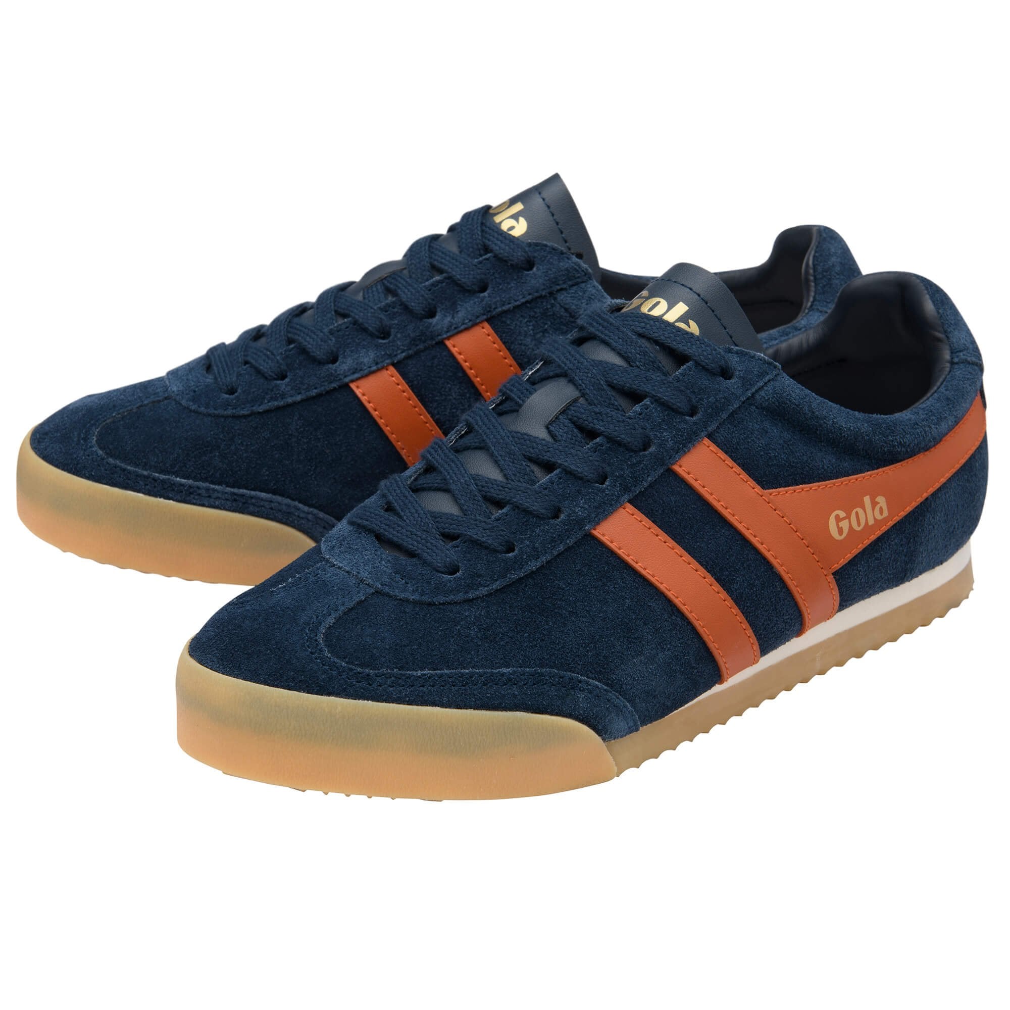 Pair of Gola Harrier suede trainers in navy blue with orange stripes and gum sole