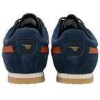 Pair of blue trainers with orange accents on a white background