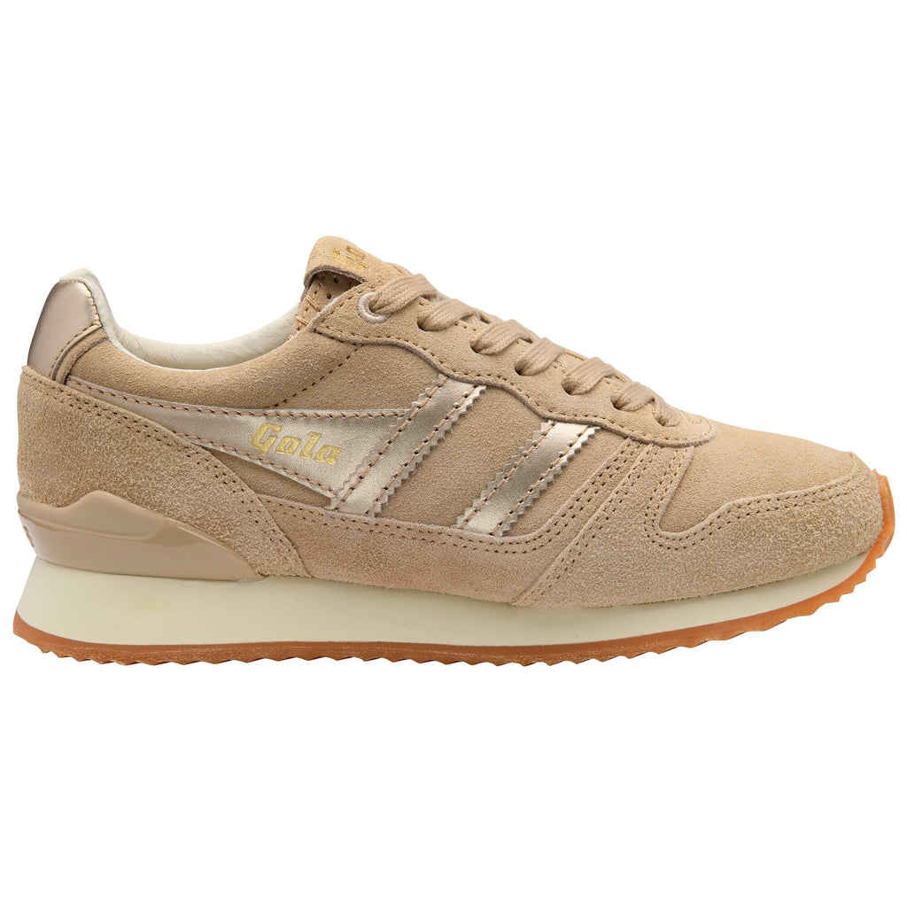 Beige trainer with metallic stripes on a white background