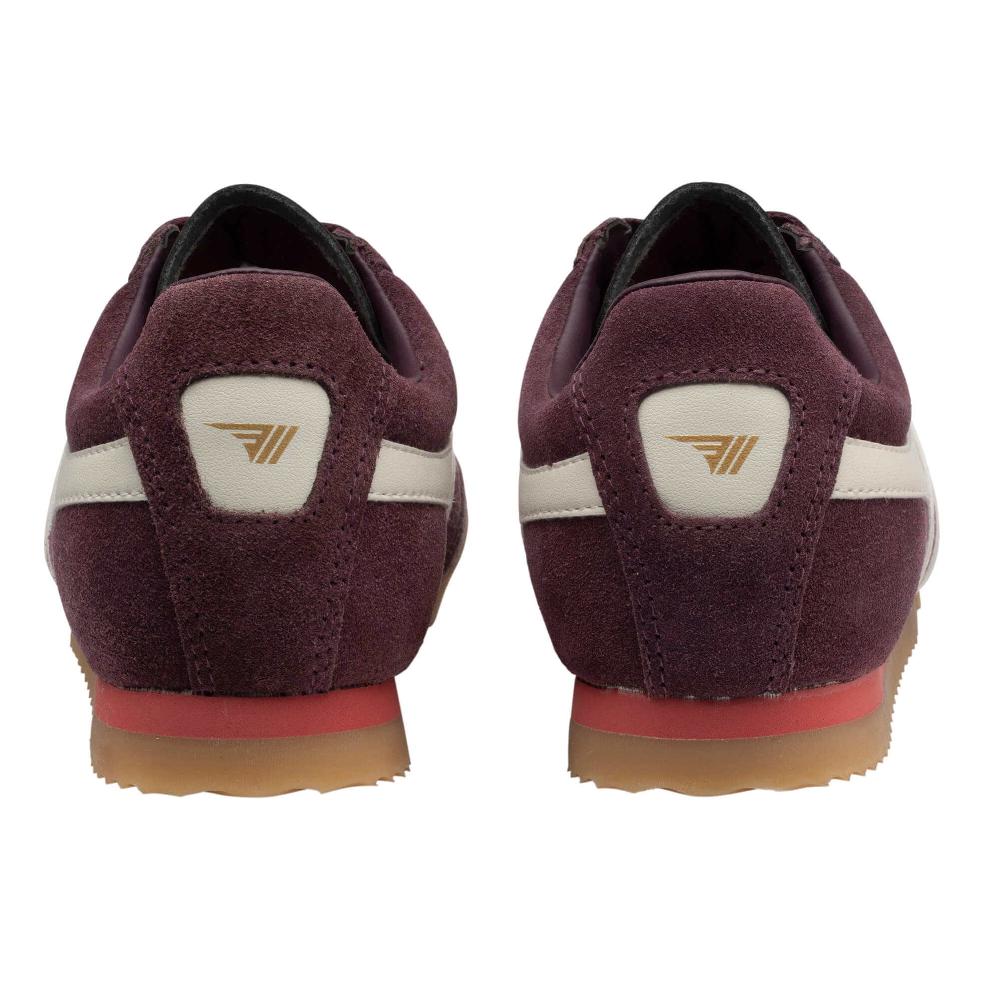 Pair of burgundy suede trainers with white stripes and gold logo on the heel