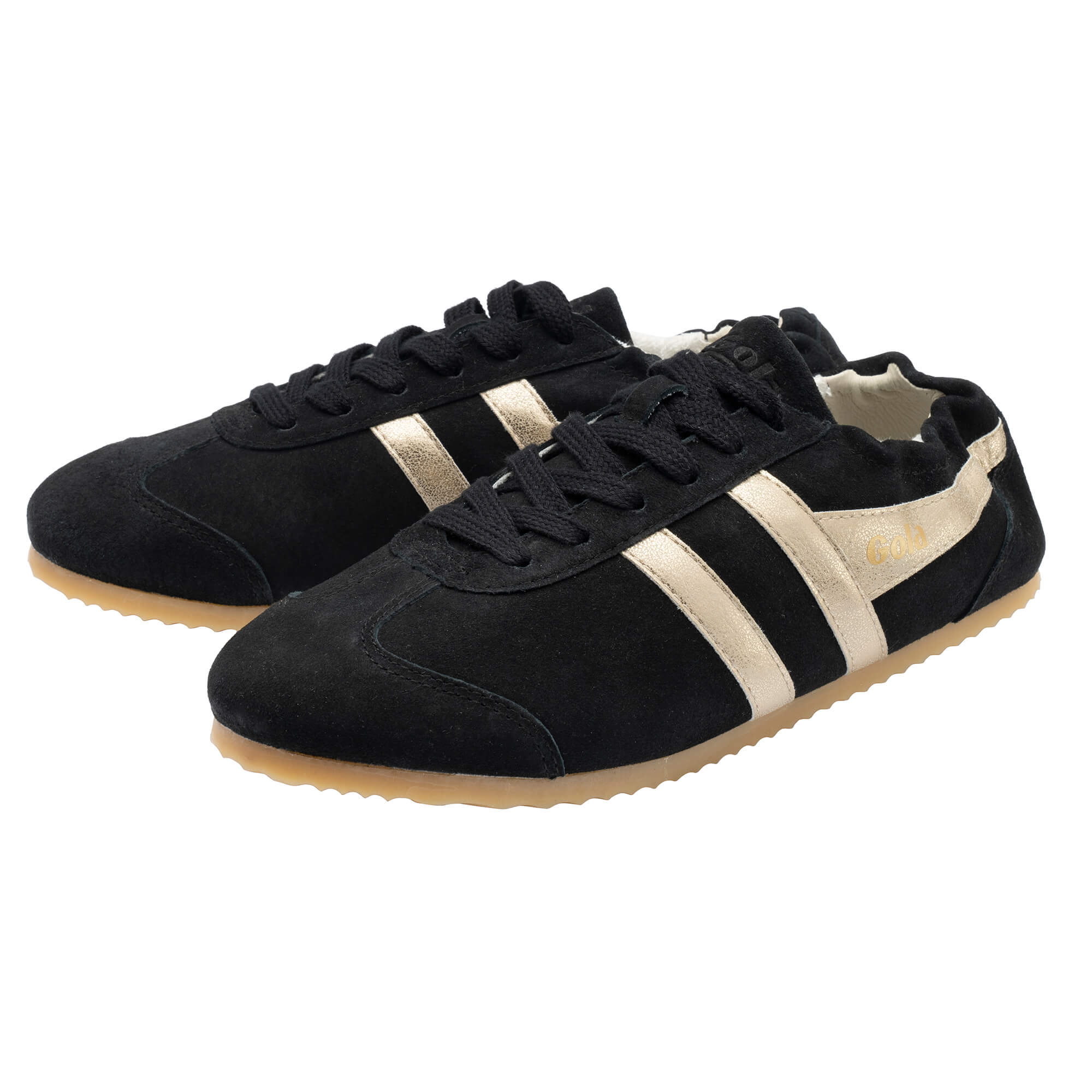 Black suede trainers with gold stripes and gum sole