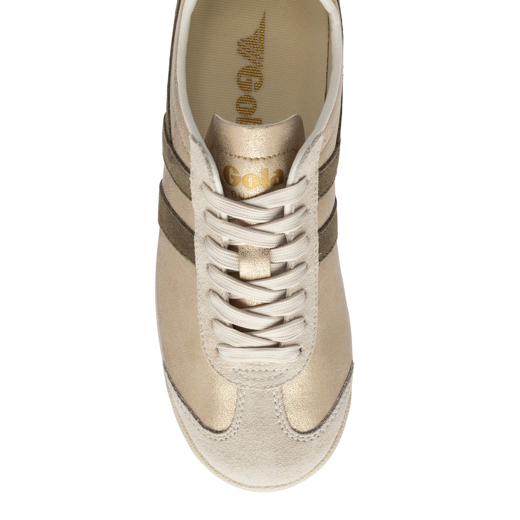 Top-down view of a Gola trainer in gold and beige with white laces