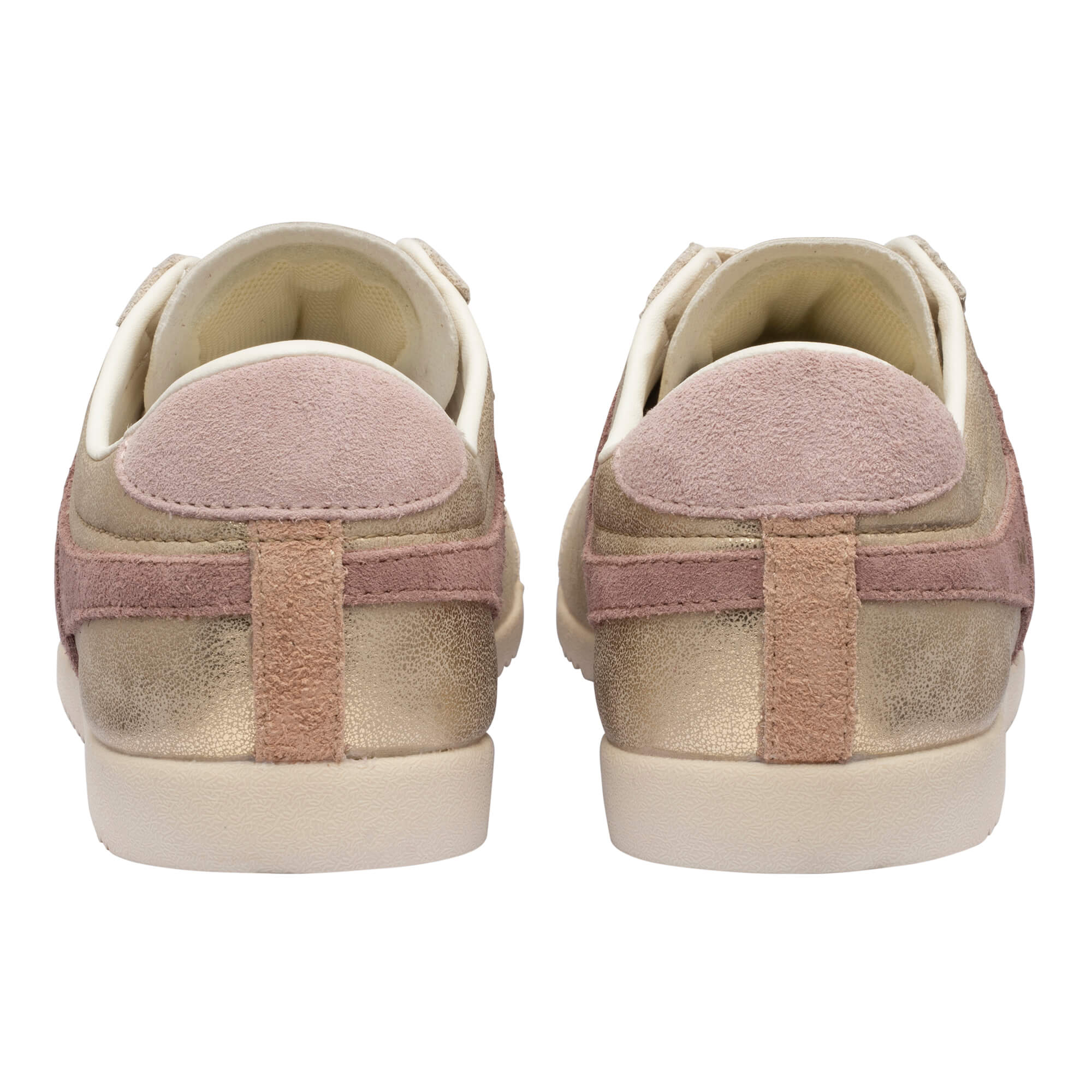 Rear view of two gold and pink trainers