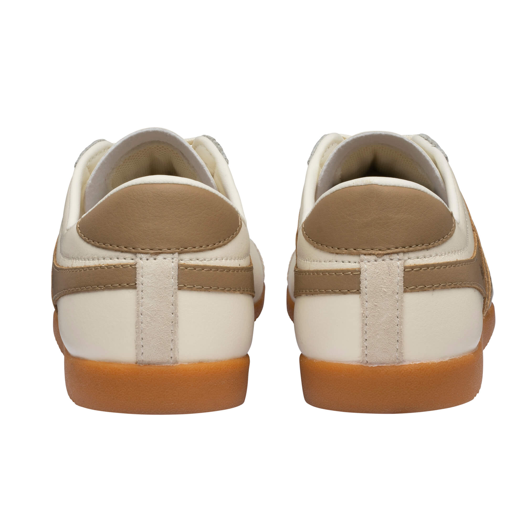 Rear view of two cream trainers with brown heel tabs and gum soles
