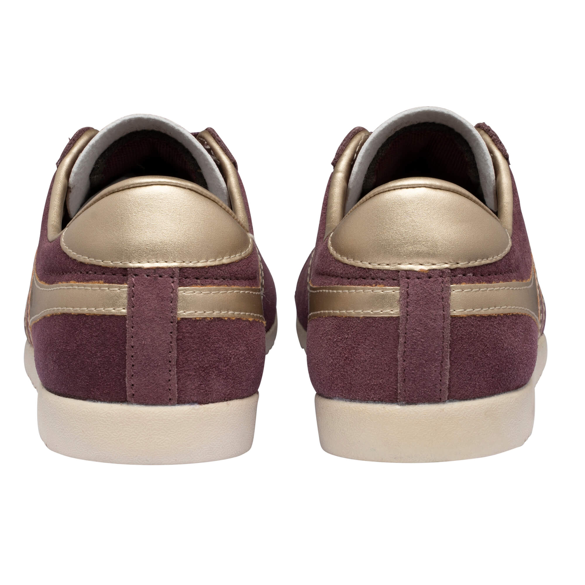 Pair of burgundy suede trainers with gold accents, rear view