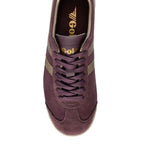 Gola Harrier suede trainers in burgundy with gold stripes and laces