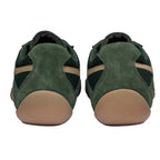 Pair of dark green suede and mesh trainers with tan soles and side stripes, rear view