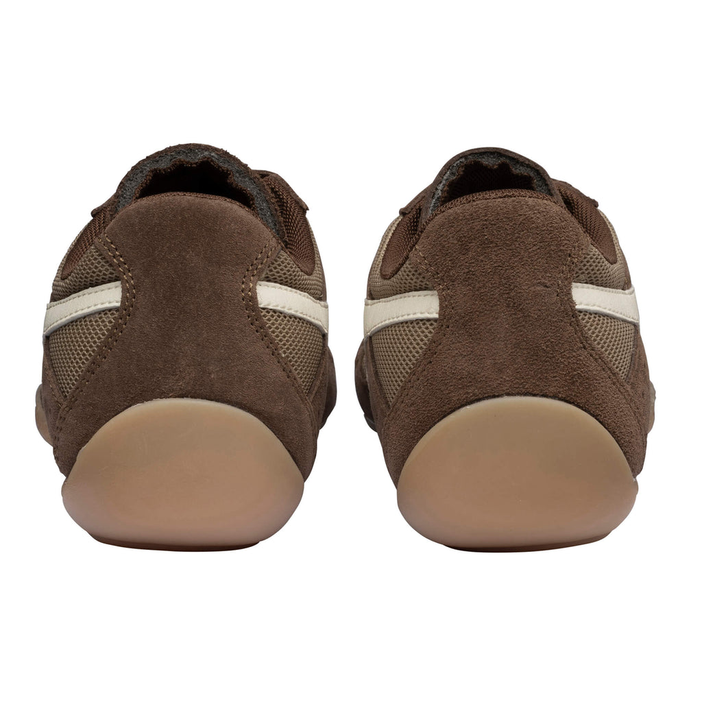 Pair of brown suede and mesh trainers with light brown soles, rear view