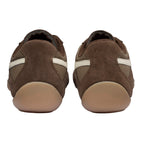 Pair of brown suede and mesh trainers with light brown soles, rear view