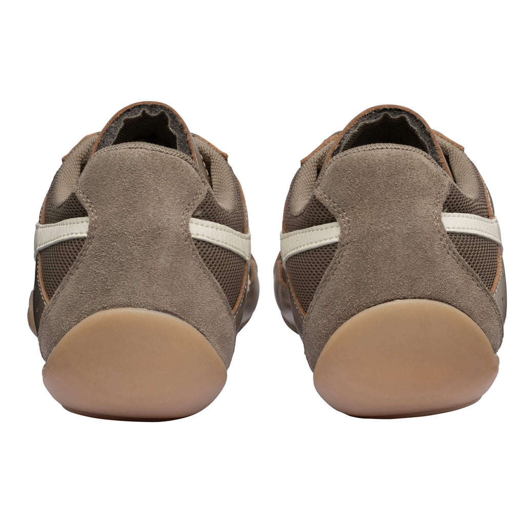 Pair of brown suede and mesh trainers with white stripes and tan soles, rear view