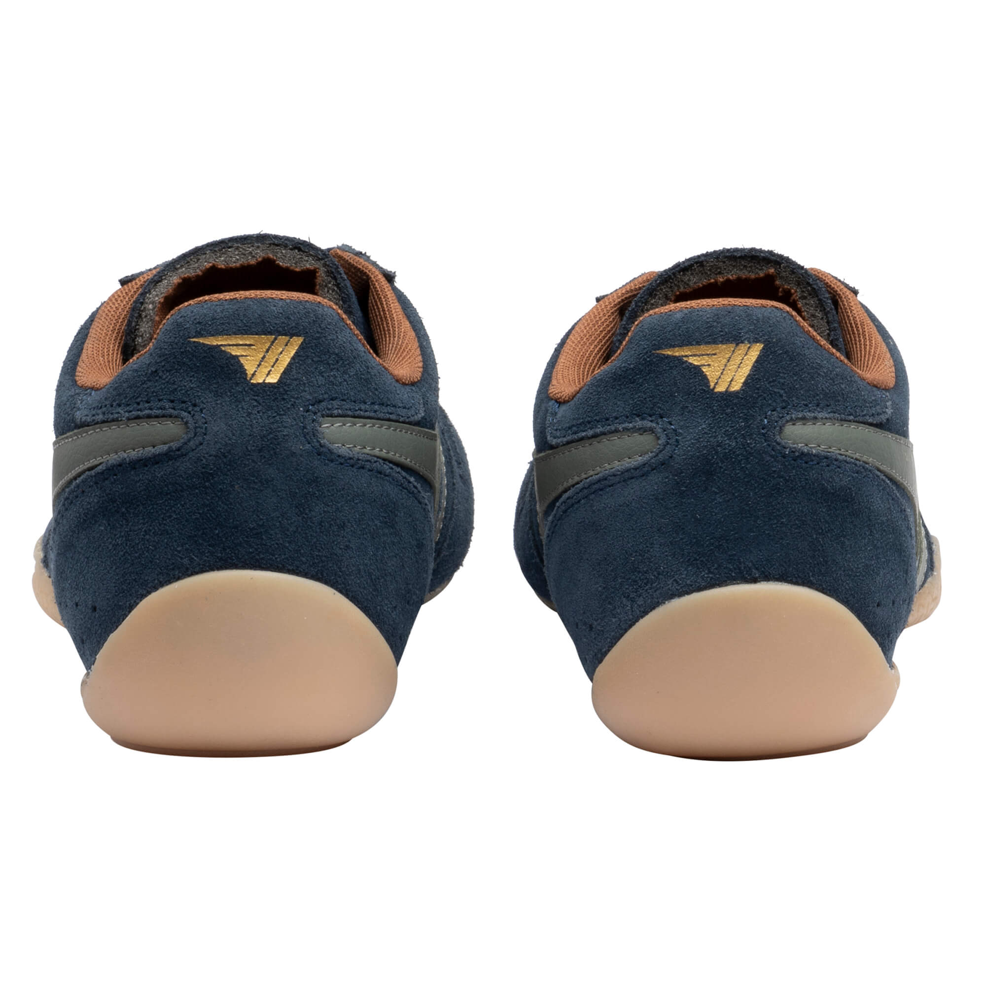 Rear view of two navy blue suede trainers with tan soles and a gold logo on the heel