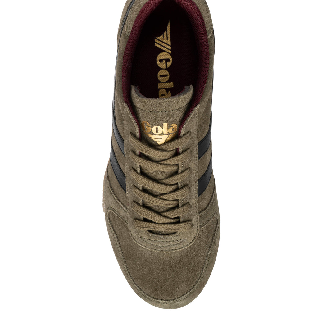 Top-down view of a Gola Harrier trainer in khaki suede with black stripes and a burgundy lining