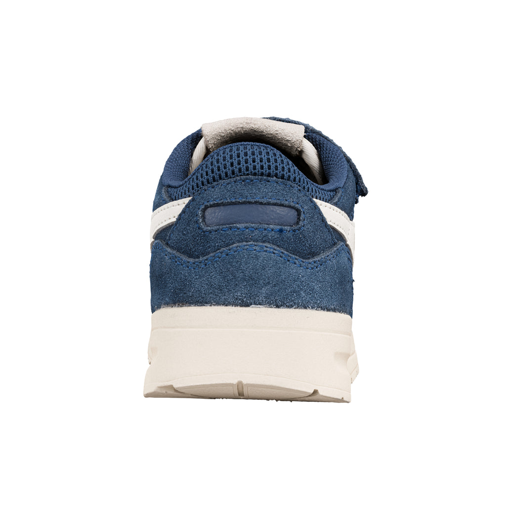 Rear view of a blue suede trainer with a cream sole