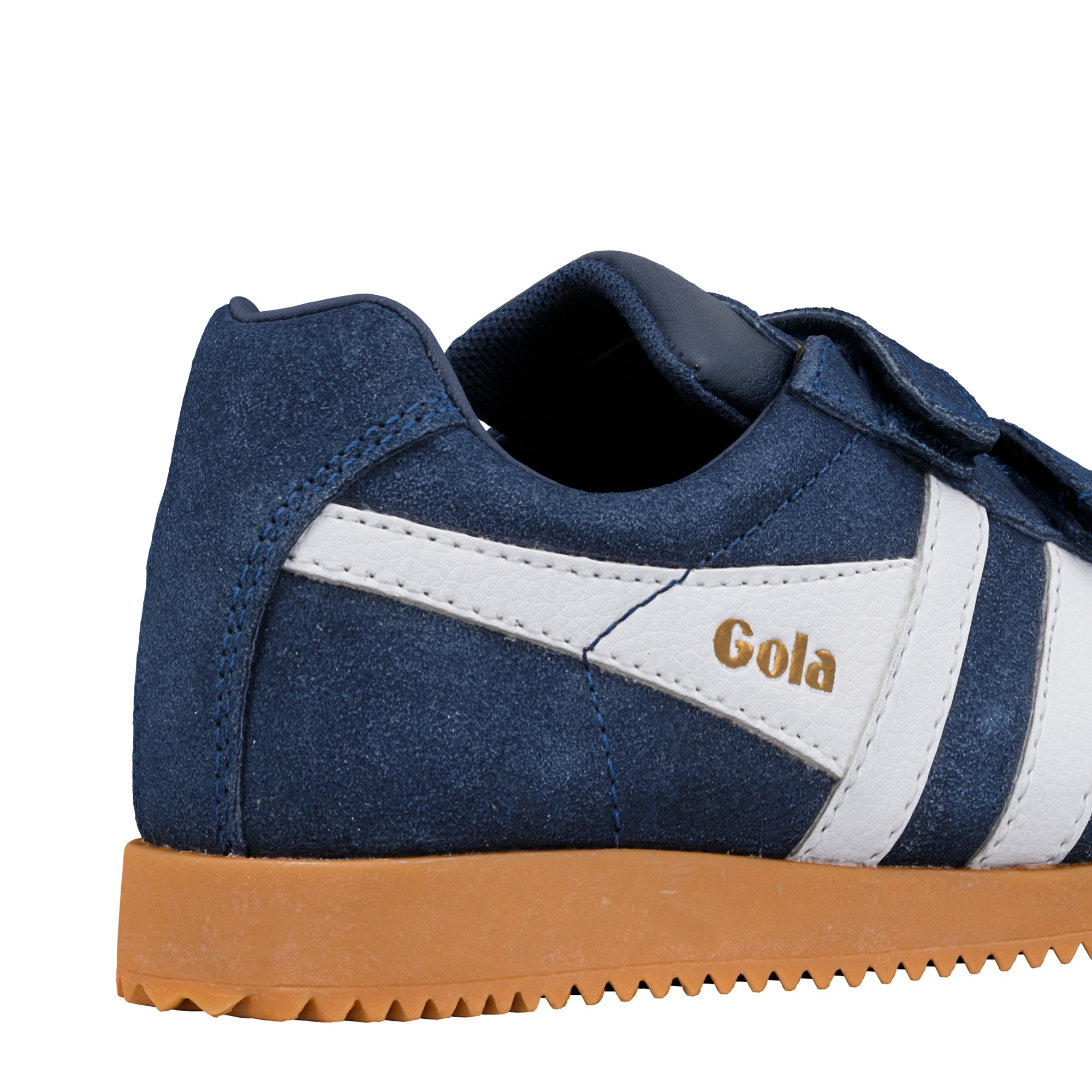 Close up of blue suede Gola trainer with white side stripe and gum sole