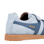 Close up of a light blue suede Gola trainer with a gum sole
