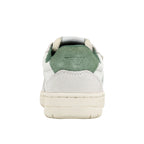 Rear view of a white and green trainer with a cream sole