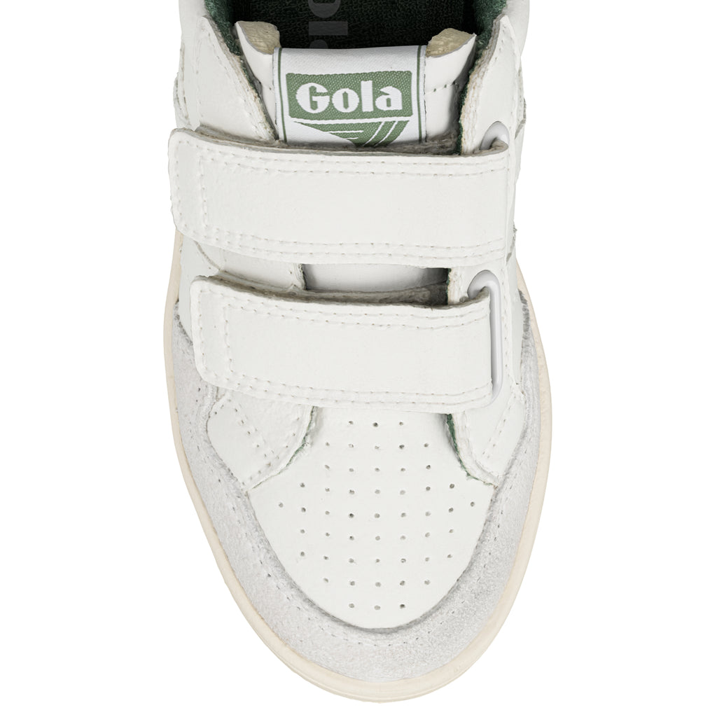 Close up of the toe of a white Gola trainer with two velcro straps and a green Gola logo on the tongue
