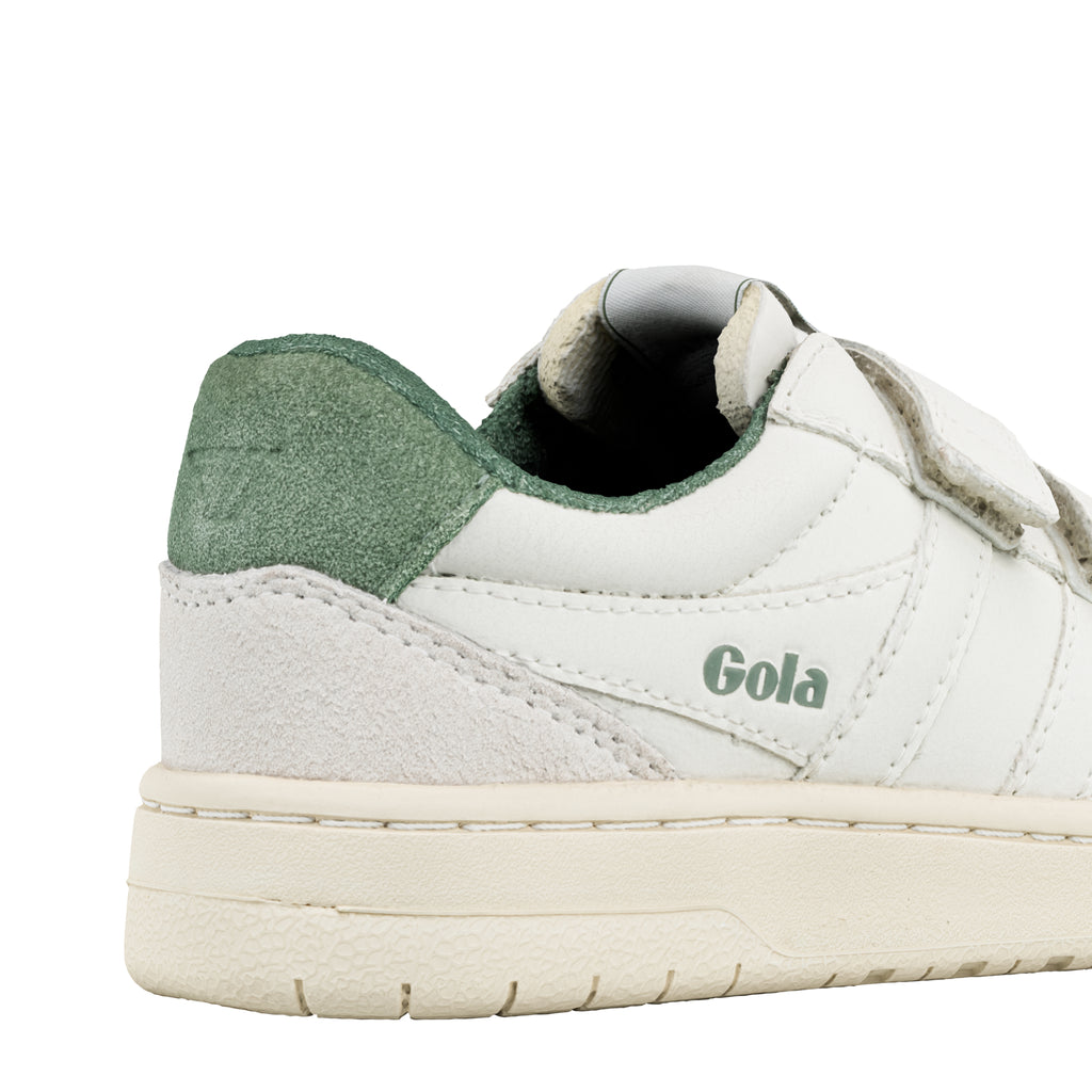 Close up of the heel of a white Gola trainer with a green suede heel tab and cream sole