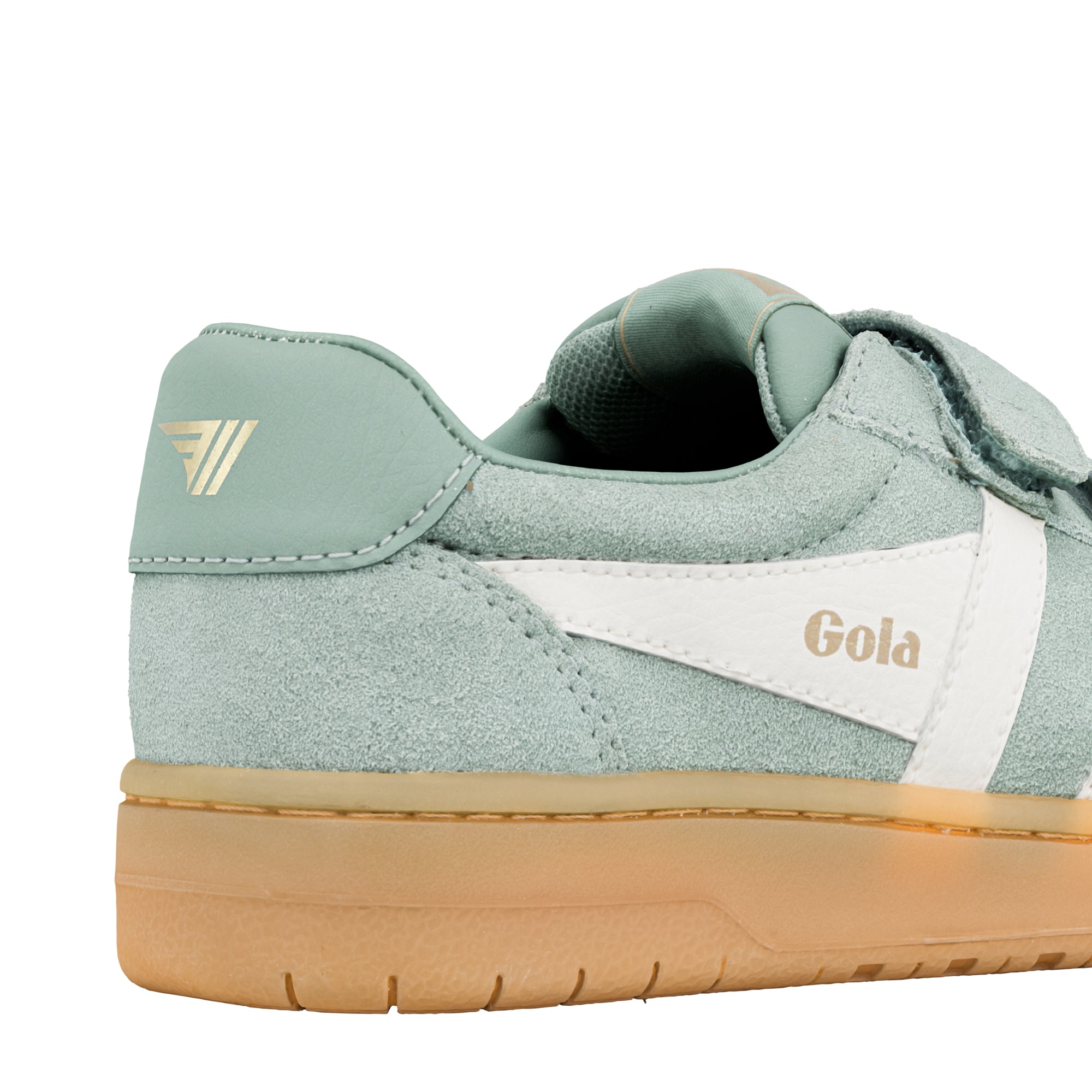 Close up of sage green suede trainer heel with white side panel and gum rubber sole