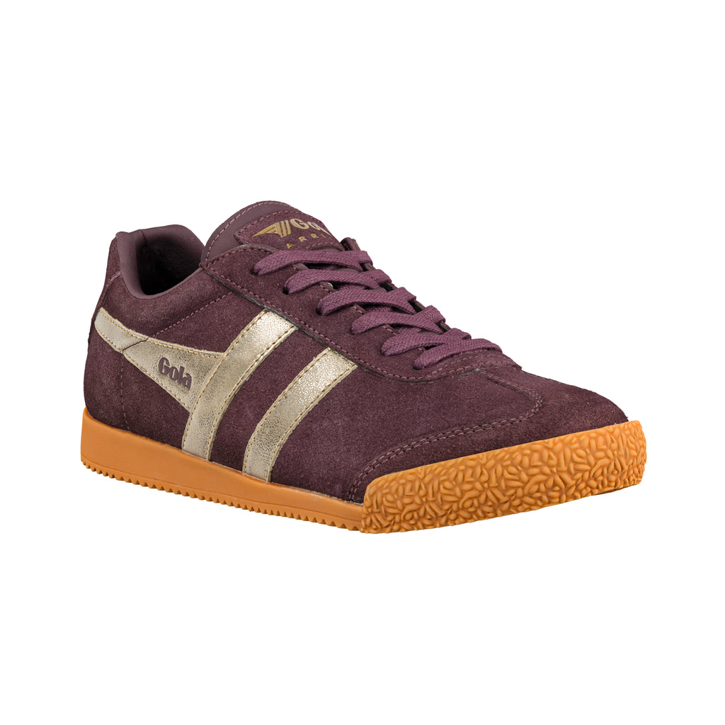 Plum suede Gola trainer with metallic gold side stripes and a textured gum sole