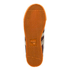 Orange rubber trainer sole with herringbone tread pattern and Gola logo