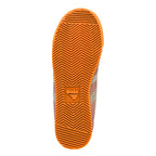 Orange rubber trainer sole with chevron tread pattern and Gola logo