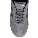 Top view of a grey suede Gola Harrier trainer with a gum sole
