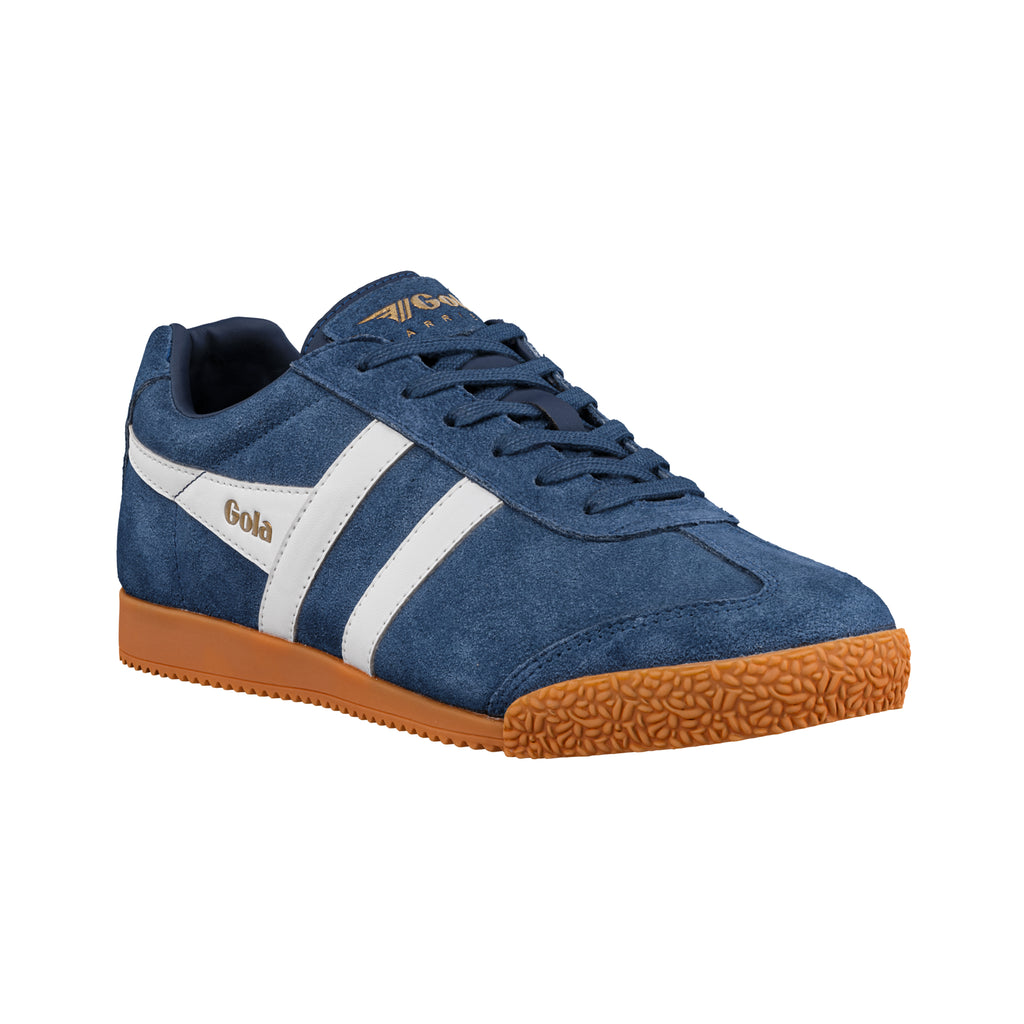 Navy blue suede trainer with white stripes and a brown sole