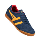 Navy blue suede trainer with yellow side stripes and a gum rubber sole