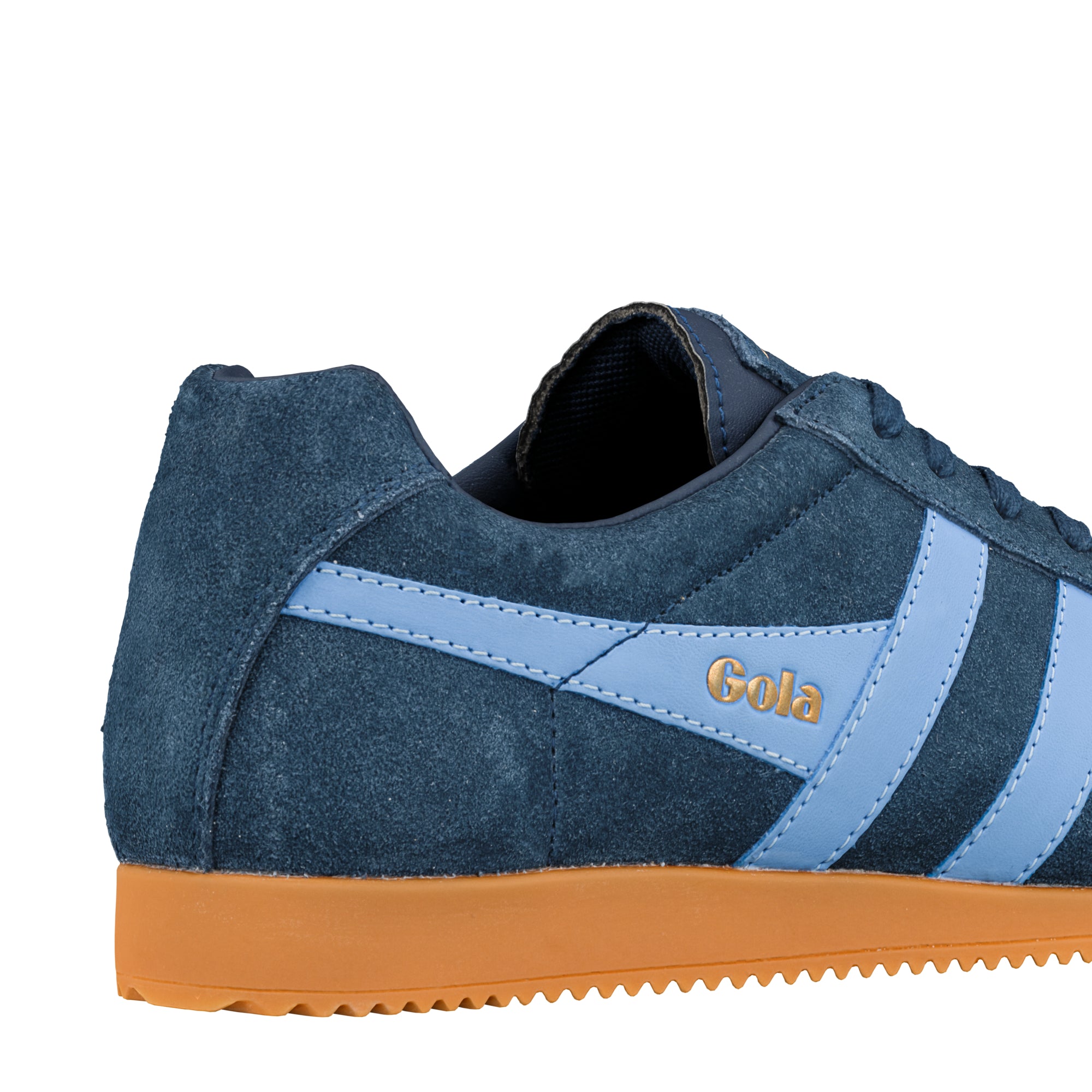 Navy blue suede trainer with light blue side stripes and a gum rubber sole