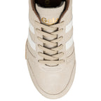 Top view of a beige suede Gola trainer with white side stripes and matching laces
